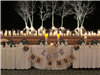 Winter white wedding reception head table with love and mr and mrs signs with white tree branches in